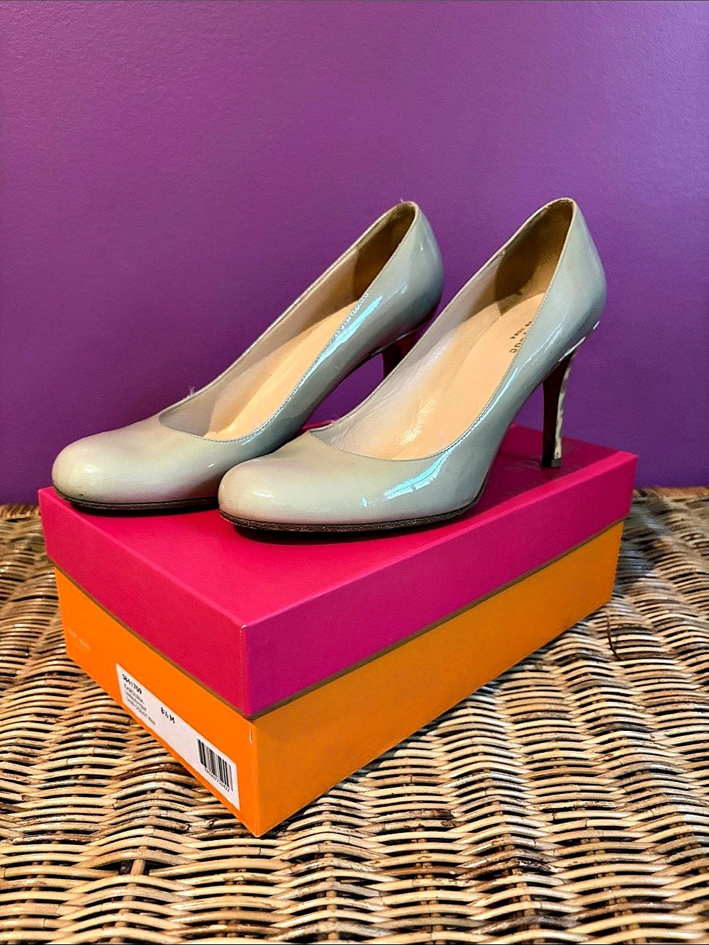 kate spade taupe patent leather heels with animal print heel detail